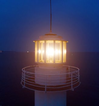 lighthouse-on-the-sea-at-night-bulgaria-varna-2022-12-16-14-53-34-utc-min